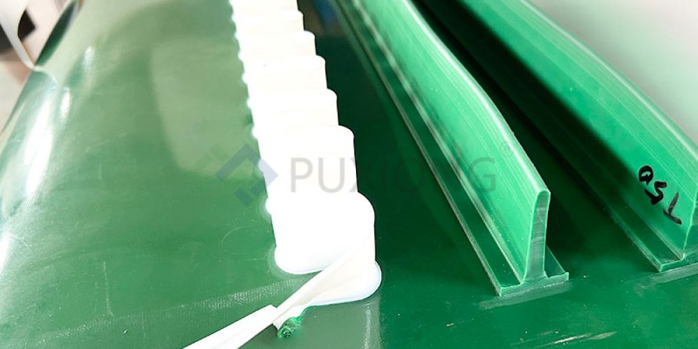 Research and development of high-temperature resistant skirted baffles: Application in rotary kilns of cement plants